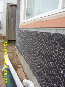 Paper and chicken-wire before stucco